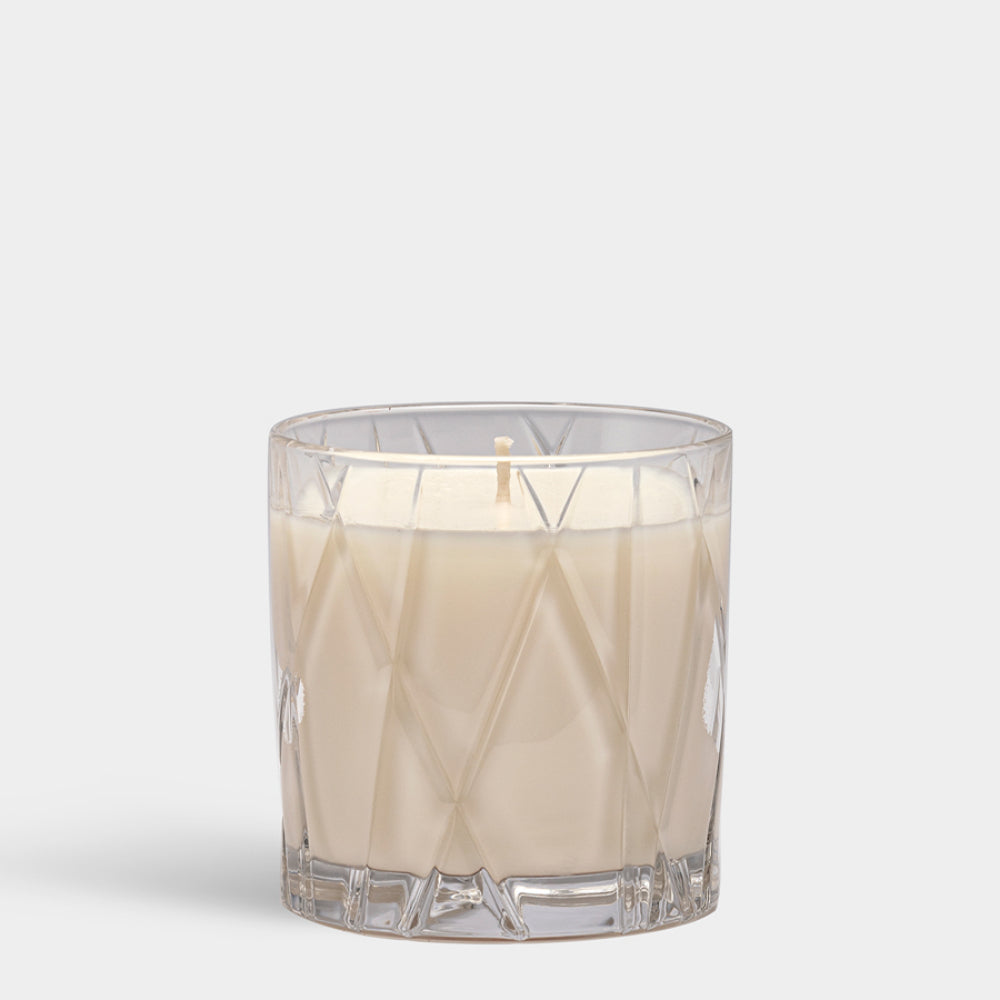 Orrefors City Candle: A Cozy Blend of Warm Amber and Oakmoss Scent